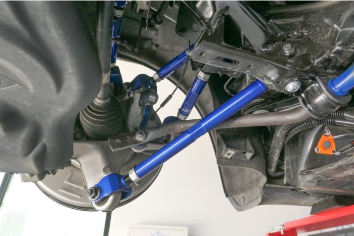 Brazo de arrastre trasero ajustable Hardrace - Tesla Model 3/Y